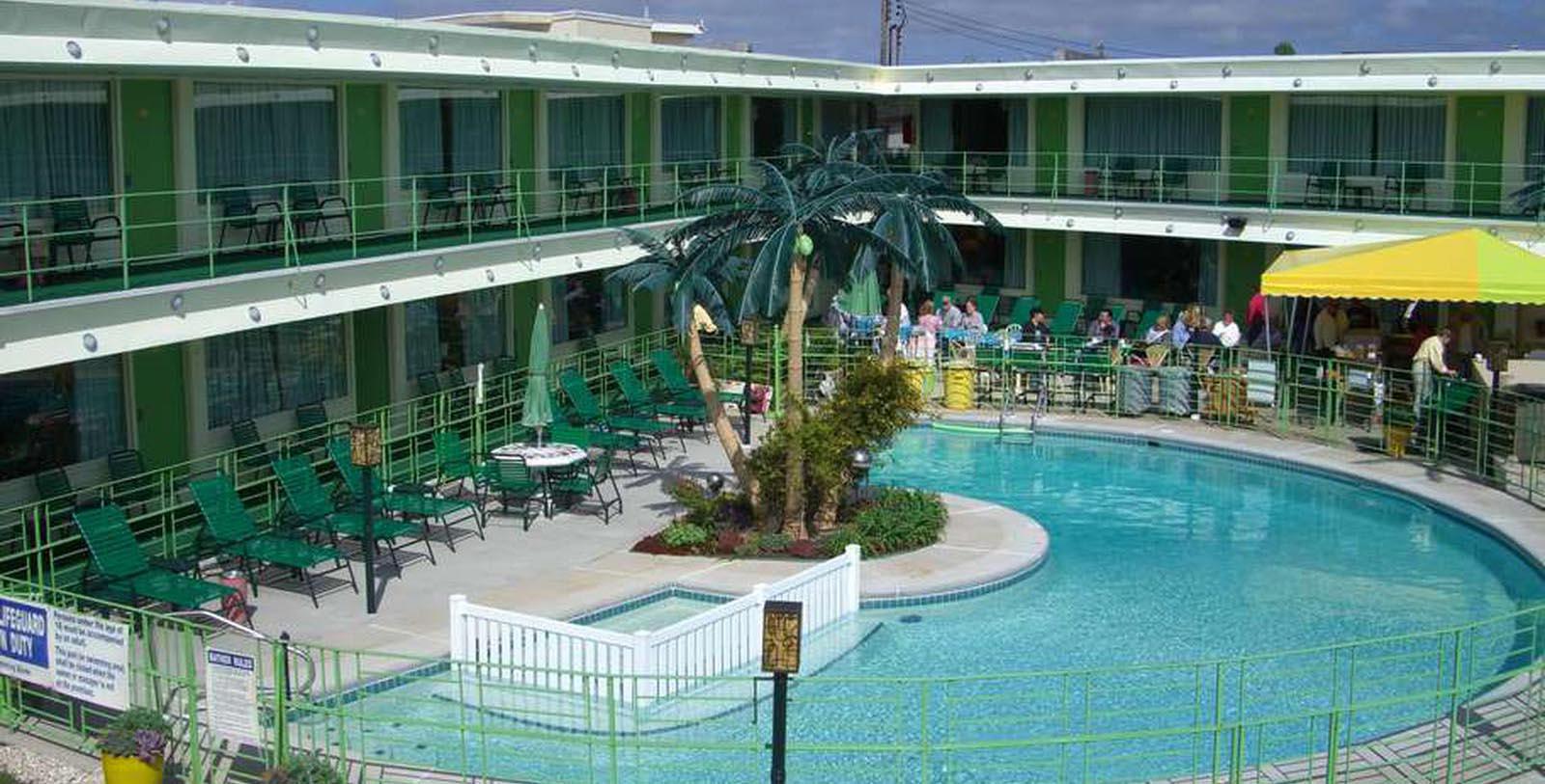 Image of Exterior with Hotel Pool at Caribbean Motel, 1957, Member of Historic Hotels of America, in Wildwood Crest, New Jersey, Special Offers, Discounted Rates, Families, Romantic Escape, Honeymoons, Anniversaries, Reunions